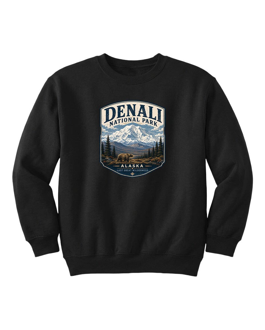 A black sweatshirt with a graphic design featuring a mountain landscape and a bear.