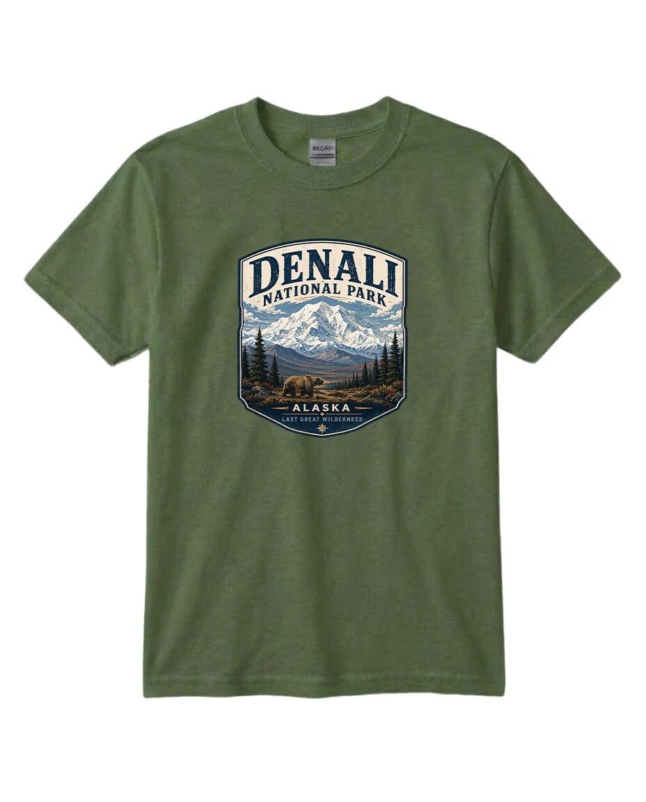 A green t-shirt with a graphic design depicting a mountain landscape with a bear and the text "DENALI NATIONAL PARK ALASKA LAST GREAT WILDERNESS".