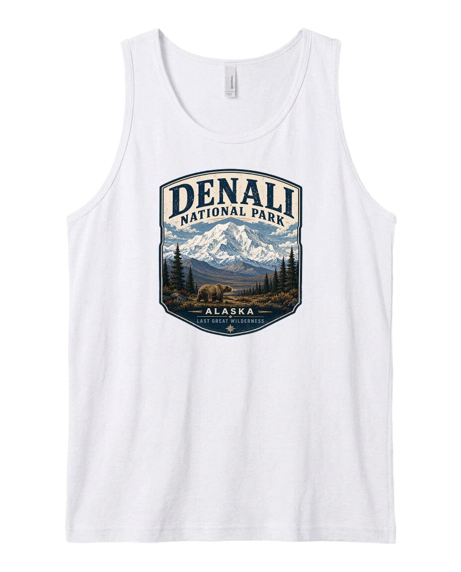 A white tank top with a graphic design depicting Denali National Park in Alaska, featuring a mountain landscape with a bear in the foreground.