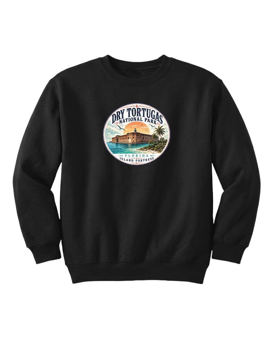 A black sweatshirt with a circular design featuring a beach scene and a building, representing Dry Tortugas National Park in Florida.