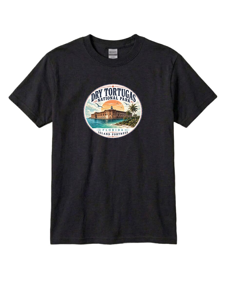 A black t-shirt with a circular graphic design featuring a beach scene and a building, along with the text "Dry Tortugas National Park, Florida, Tortuga Island".