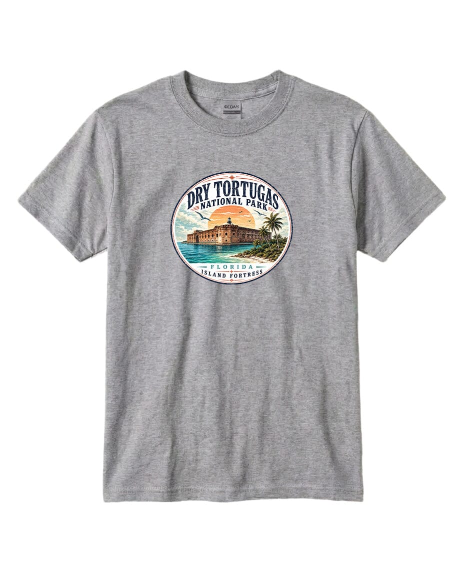 A gray t-shirt with a circular graphic design featuring a beach scene and a building, along with the text "Dry Tortugas National Park, Florida, Tortuga Island, Florida, Florida Coastline".