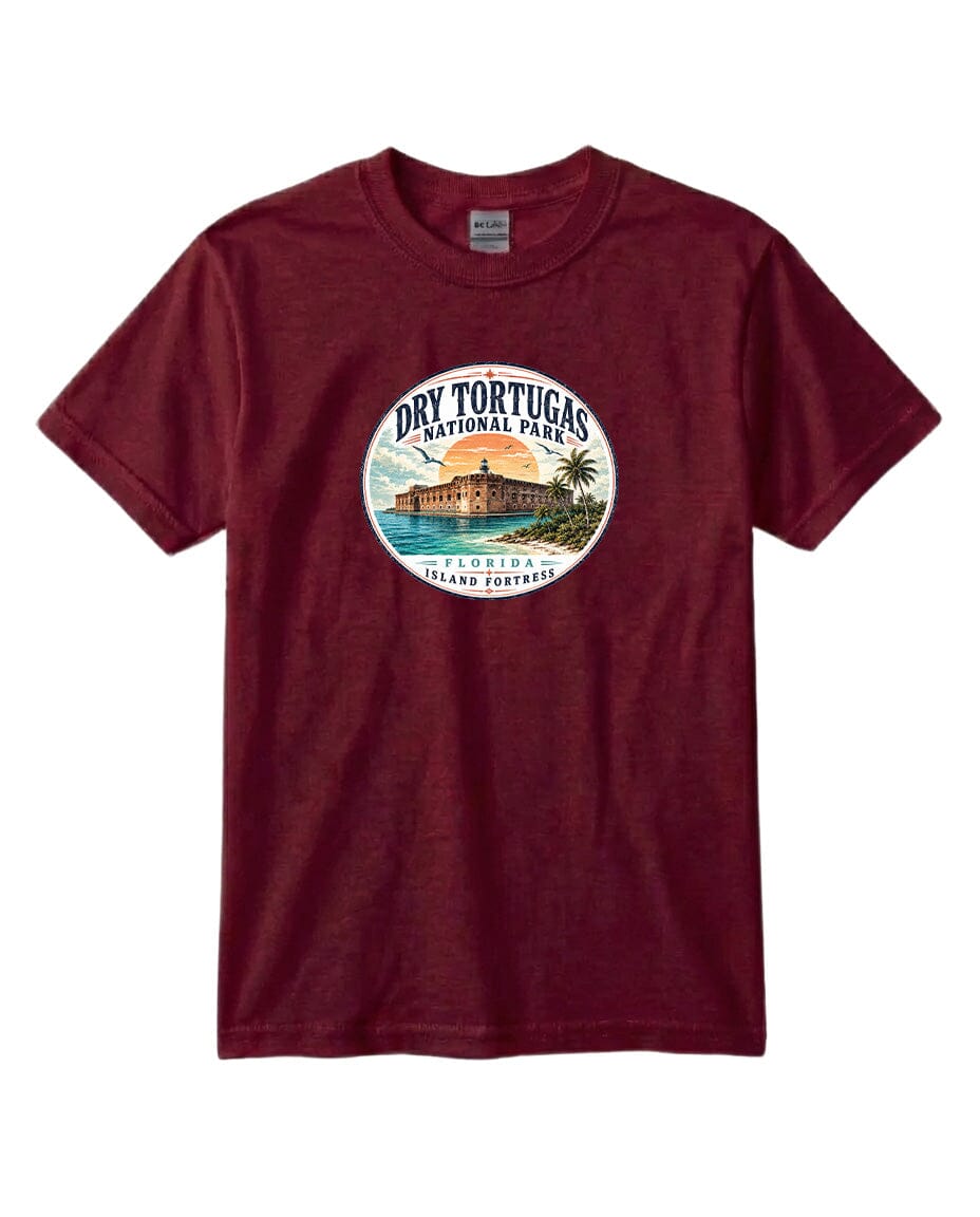 A burgundy-colored t-shirt with a circular graphic design featuring a tropical beach scene and a building.
