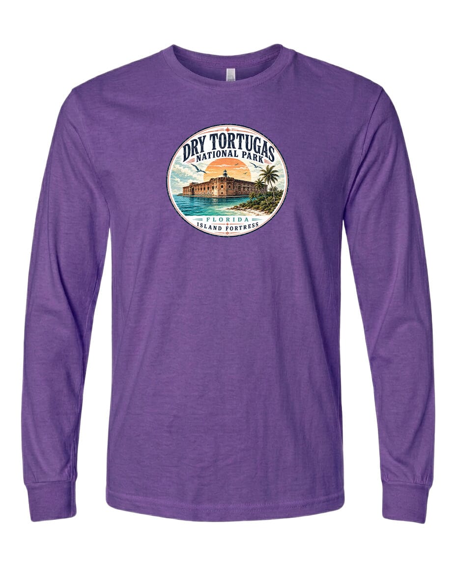 A purple long-sleeved t-shirt with a circular graphic design featuring a tropical island landscape with palm trees, a beach, and a building.