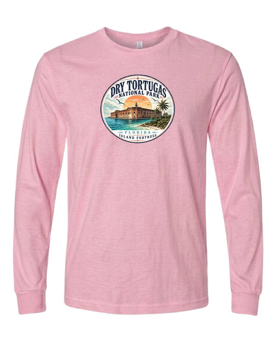 A pink long-sleeved t-shirt with a circular graphic design featuring a tropical island and palm trees, along with the text "Dry Tortugas National Park, Florida, Island of the West Pass".
