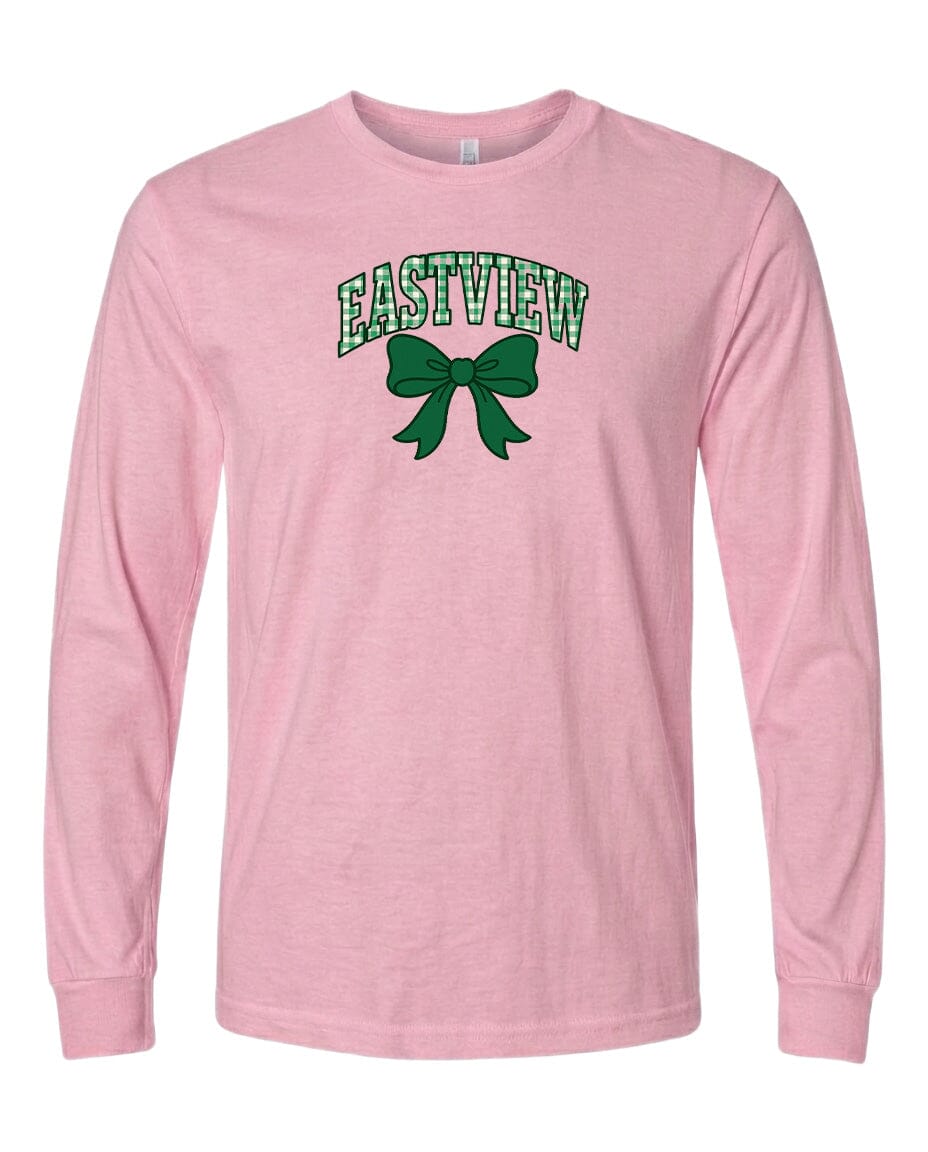 A pink long-sleeved t-shirt with a green bow and the word "EASTVIEW" printed on it.