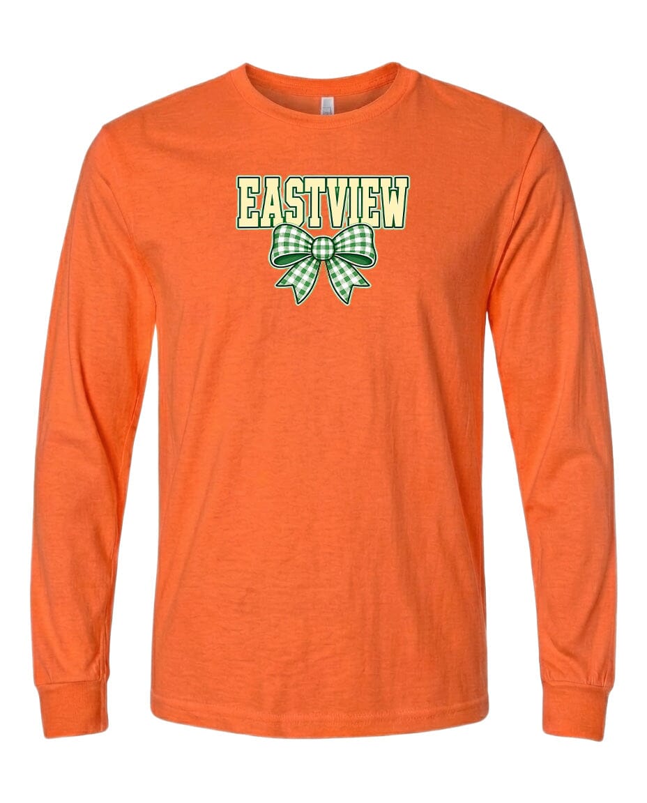 An orange long-sleeved t-shirt with a green and white bow on the front.