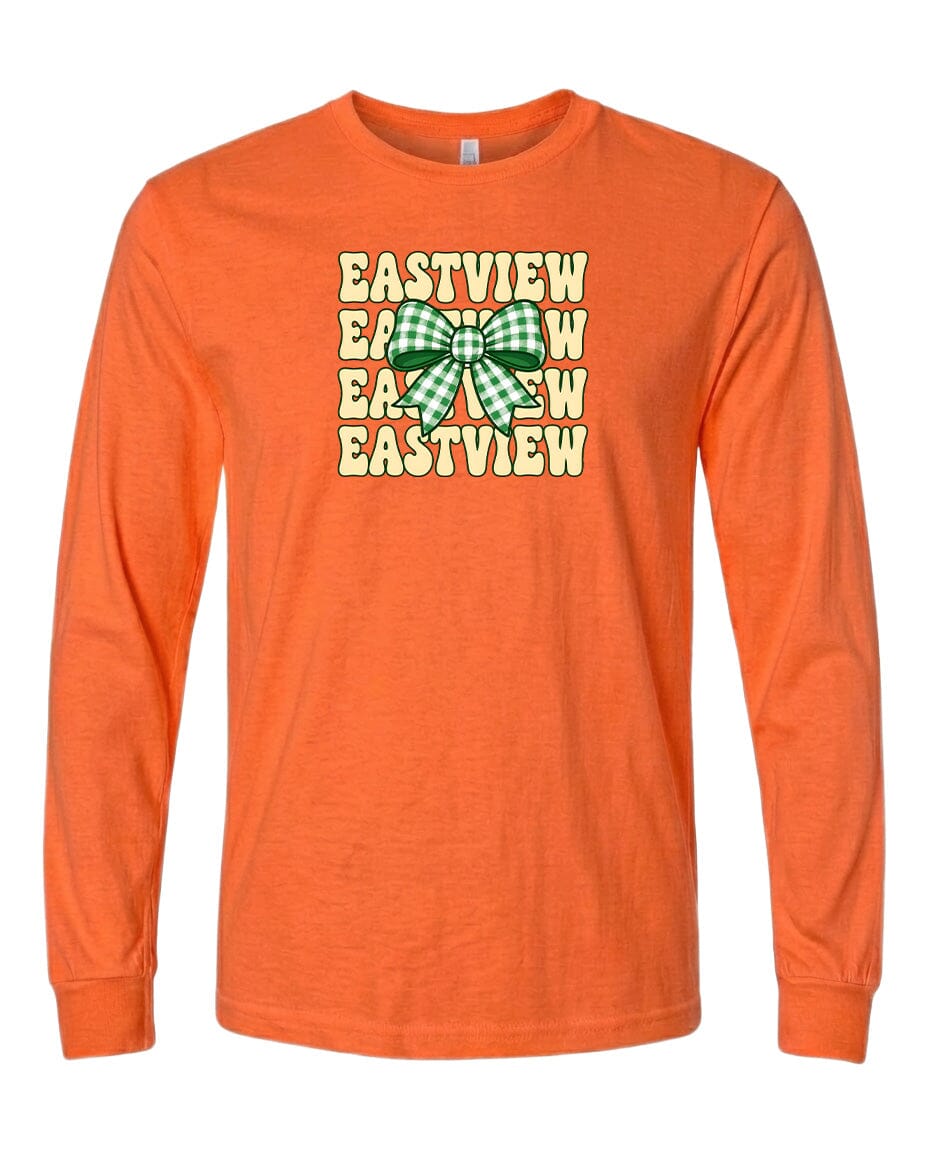 An orange long-sleeved t-shirt with a graphic design featuring a green and white bow and the text "EASTVIEW" repeated multiple times in a vertical arrangement.