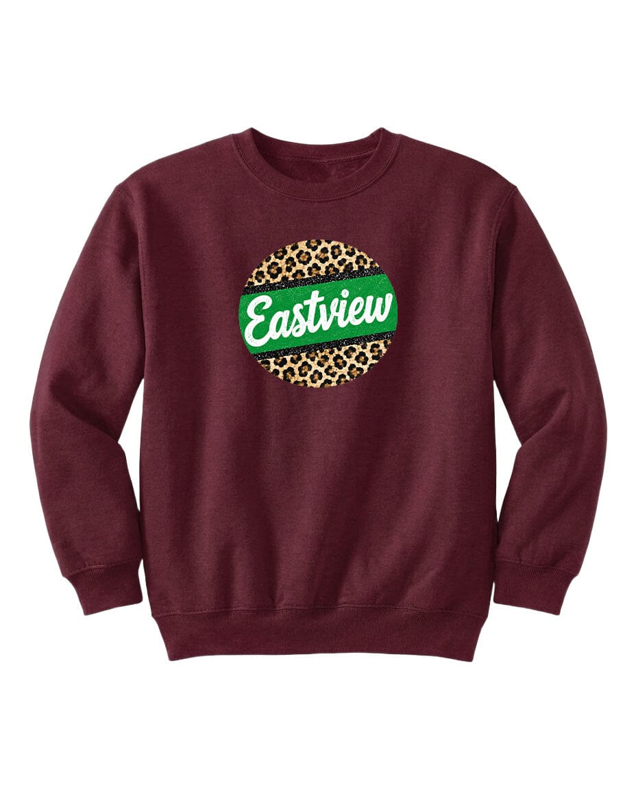 A burgundy sweatshirt with a green and leopard print circular logo on the front.