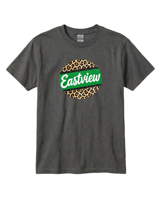 A gray t-shirt with a circular graphic design on the front. The design consists of a green circle with a leopard print pattern, and the word "Eastview" written in white cursive text inside the circle.