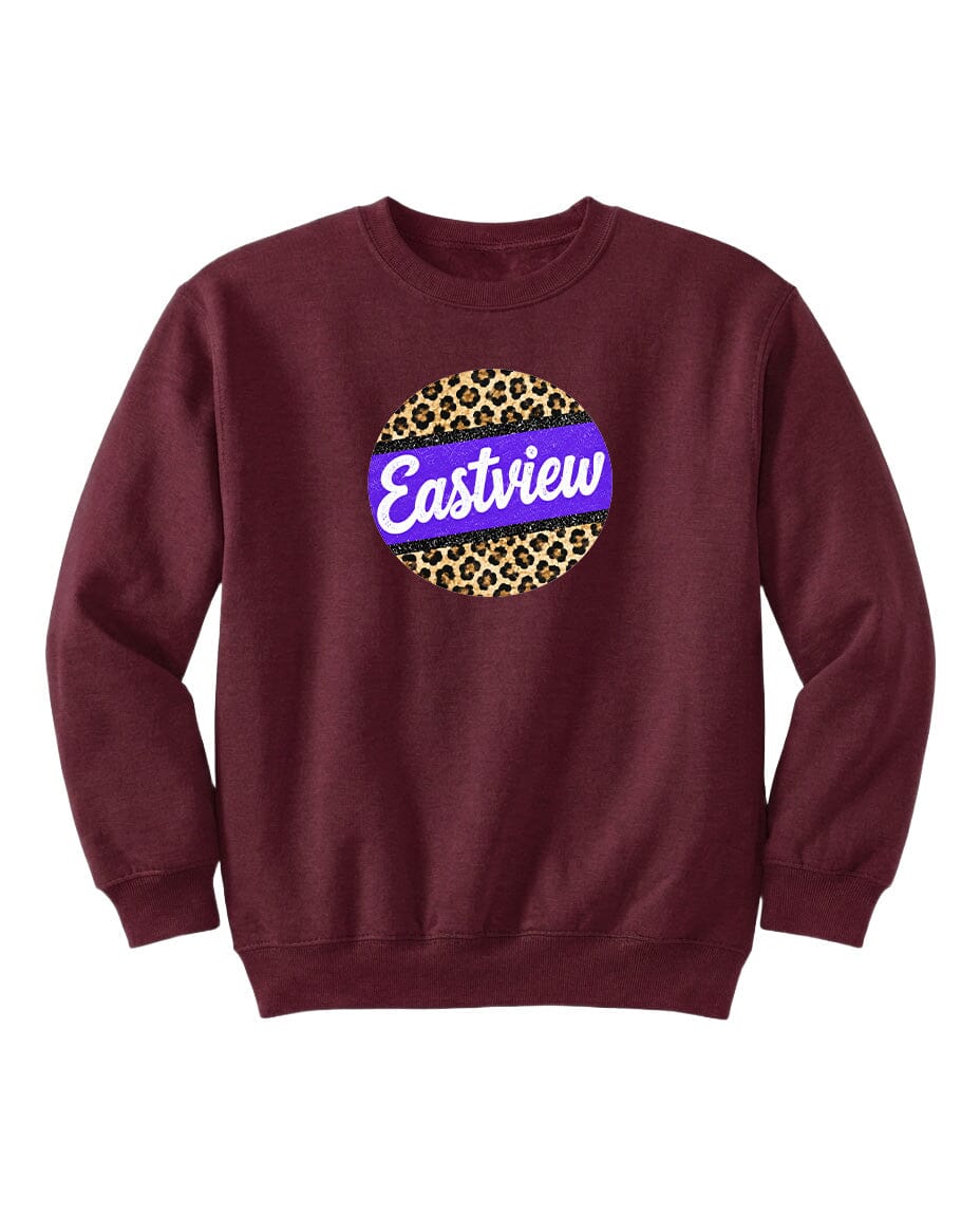 A burgundy sweatshirt with a leopard print design and the word "Eastview" printed on it.