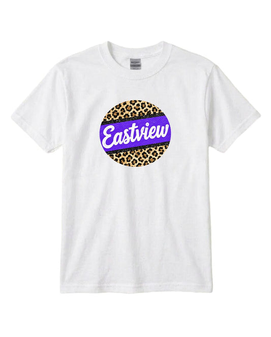 A white t-shirt with a circular graphic design featuring a leopard print pattern and the word "Eastview" written in purple text.