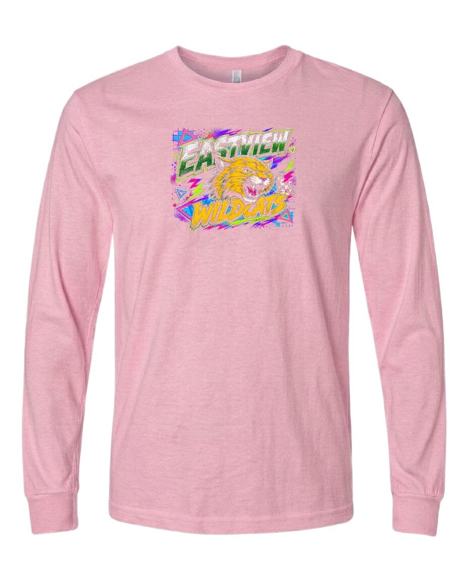 A pink long-sleeved t-shirt with a graphic design featuring a yellow and green tiger-like creature surrounded by colorful, abstract shapes.