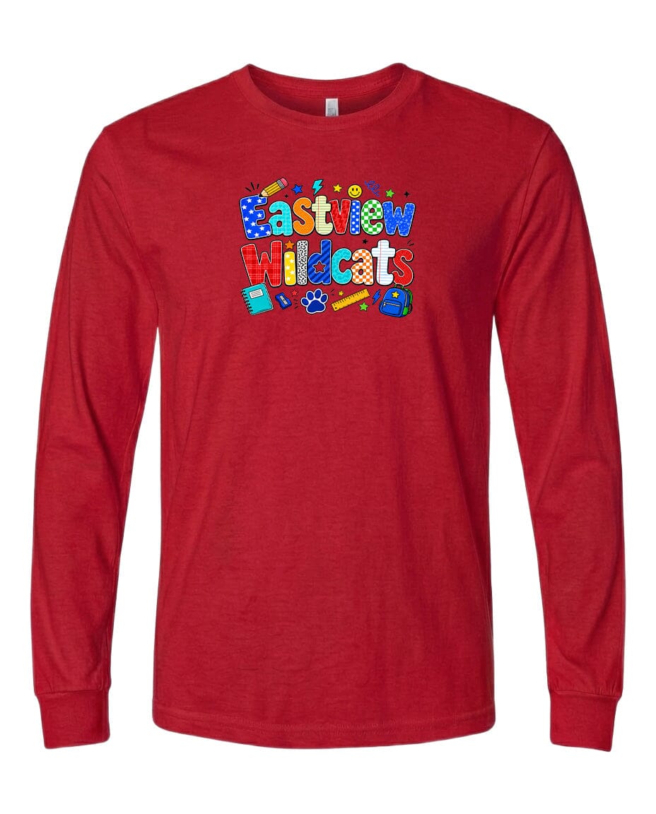 A red long-sleeved t-shirt with a colorful graphic design featuring the text "Eastview Wildcats" and various school supplies such as a pencil, eraser, and ruler.