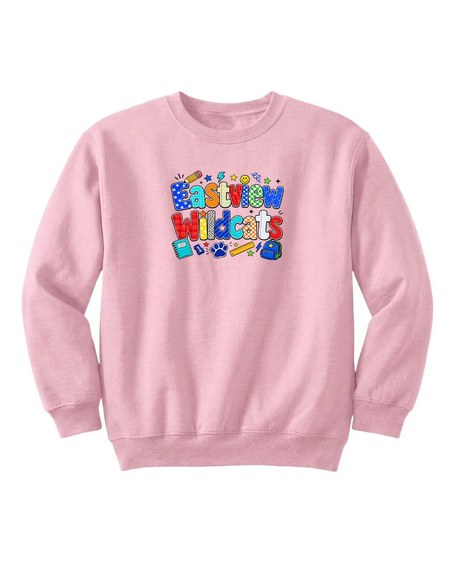 A pink sweatshirt with a colorful graphic design featuring the text "Eastview Wildcats" and various cartoon-style icons.