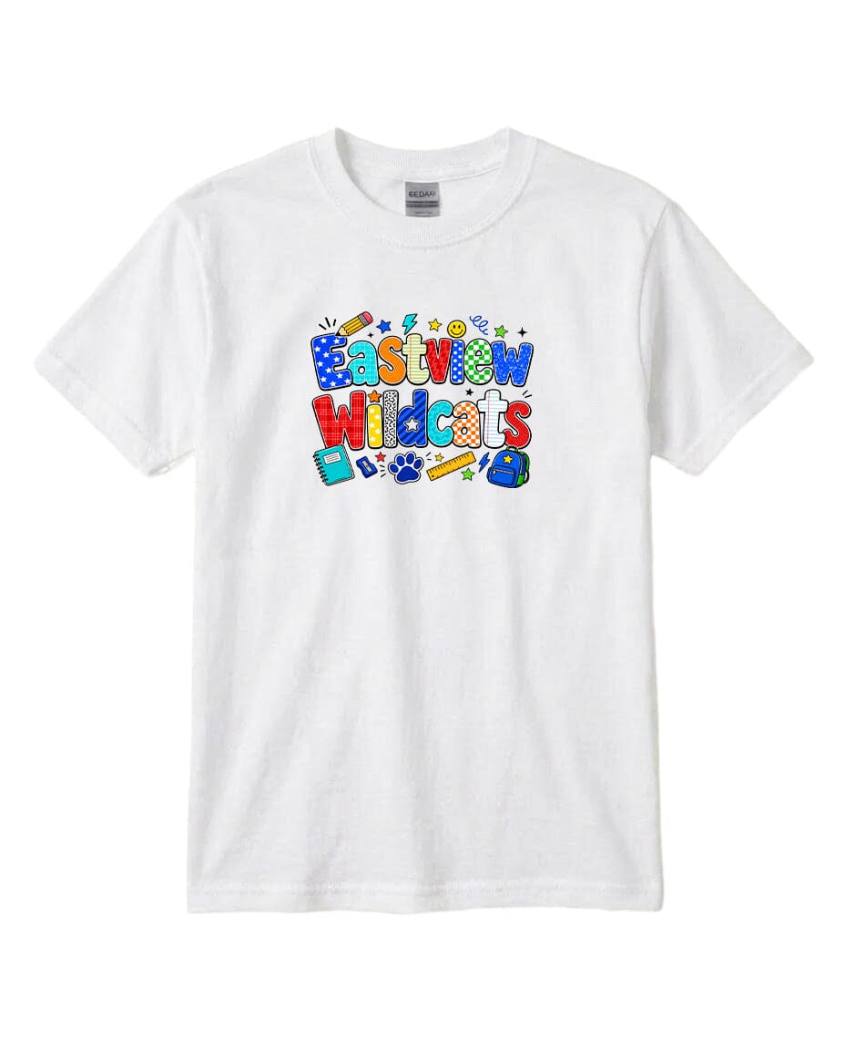 A white t-shirt with a colorful graphic design featuring the text "Eastview Wildcats" surrounded by various school-related icons and objects.
