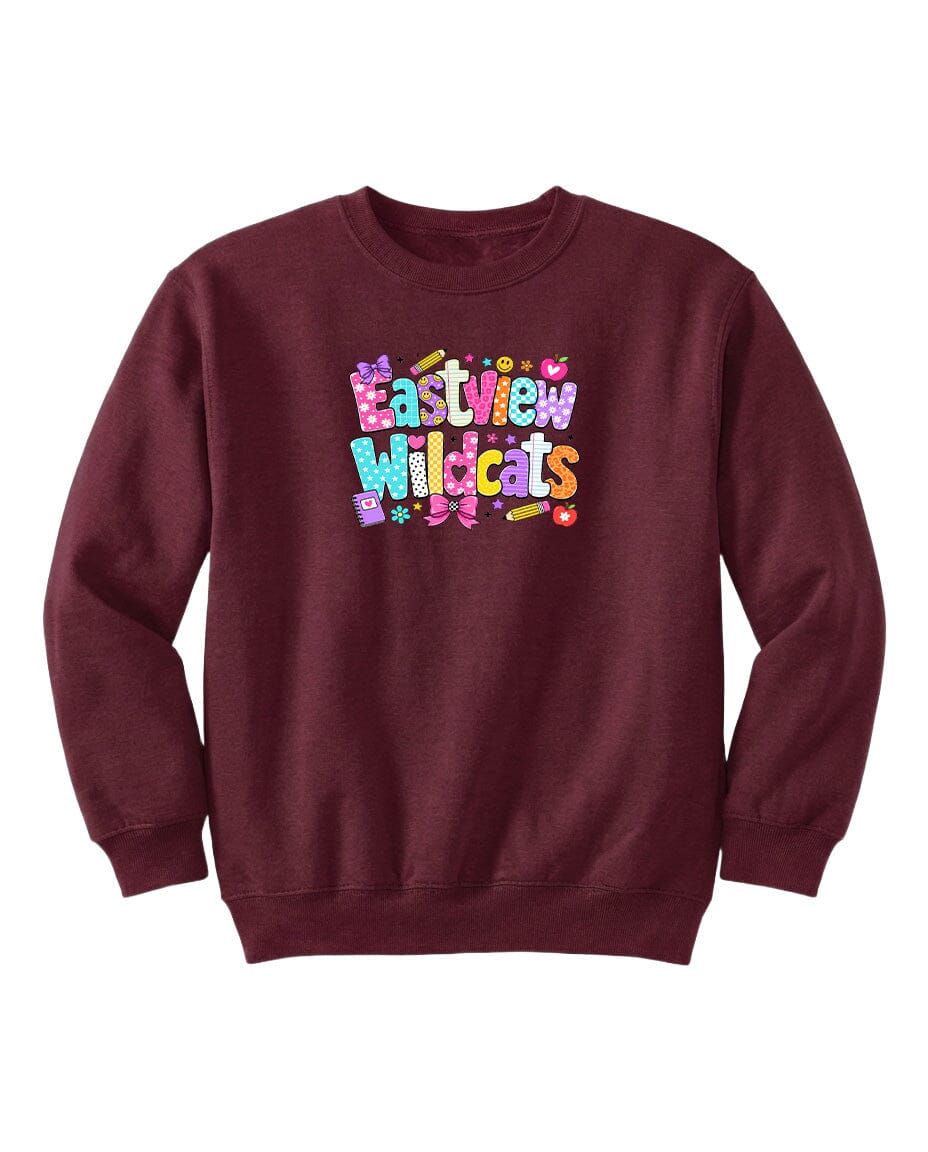 A burgundy sweatshirt with a colorful graphic design featuring the text "Eastview Wildcats" in a playful font.