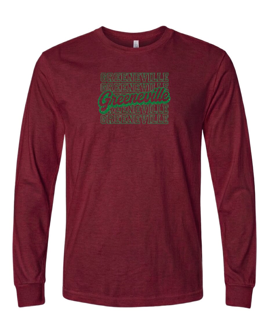 A burgundy long-sleeved t-shirt with a graphic design on the front. The design features the text "Greenville" repeated in a pattern across the shirt.